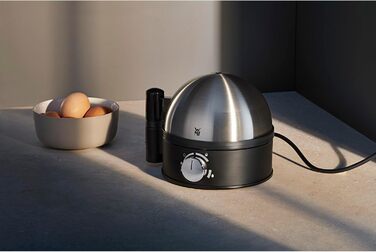 Електричний яйцеварка WMF Stelio: 1-7 яєць, нержавіюча сталь, регулювання ступеня нагріву, функція продовження нагріву, мірний стаканчик