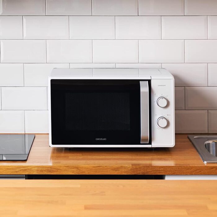 Мікрохвильова піч ProClean 3010, 20 літрів, Ready2Clean покриття, 700 Вт, 6 функцій, таймер 30 хв, режим розморожування, білий колір (20L | GrandHeat)