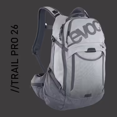Рюкзак EVOC TRAIL PRO 26л з захистом спини LITESHIELD PLUS, для трейлрайдингу та перегонів, легкий, відділення під питну систему 3л, розмір S/M, колір сірий/карбоновий