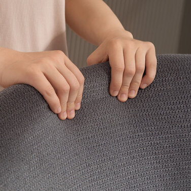 Сучасне крісло з м'якими підлокітниками, висока спинка, товста оббивка, металеві ніжки, сірого кольору