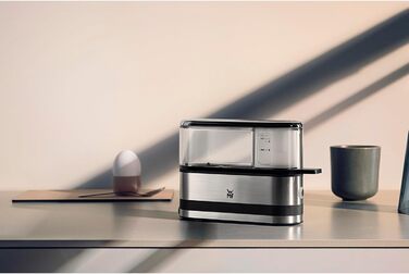 Електричний яйцеварка WMF Stelio з нержавіючої сталі, для 1-7 яєць, 380 Вт, регулювання ступеня готовності, функція підтримання тепла, мірний стаканчик з підставкою для яєць