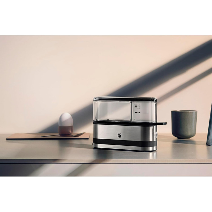 Електричний яйцеварка WMF Stelio з нержавіючої сталі, для 1-7 яєць, 380 Вт, регулювання ступеня готовності, функція підтримання тепла, мірний стаканчик з підставкою для яєць