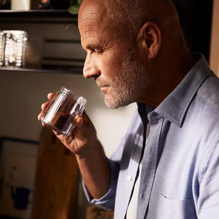 Кавомолка Tchibo ручна, керамічний жорно, регульований помел, срібна