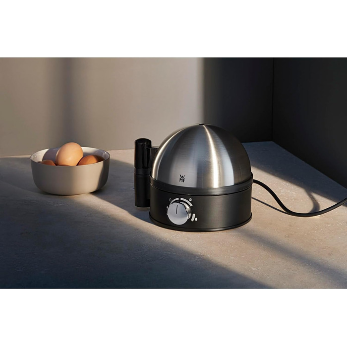 Електричний яйцеварка WMF Stelio: 1-7 яєць, нержавіюча сталь, регулювання ступеня нагріву, функція продовження нагріву, мірний стаканчик