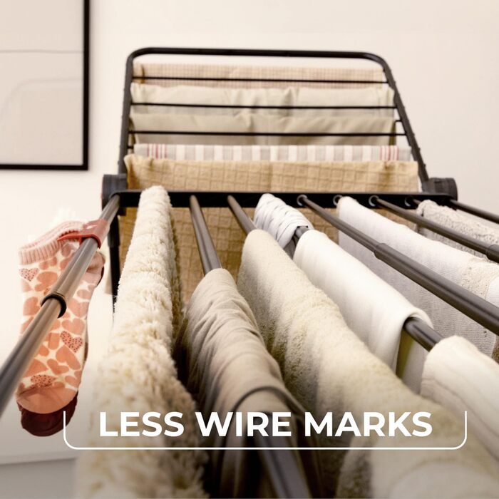 Сушарка для білизни Vileda Infinity Flex Ultimate Black Edition з розсувним телескопічним каркасом, XXL-стійками, чорного кольору. Складається та поставляється у зібраному вигляді. Ідеальна для великої кількості білизни. Екологічна упаковка.