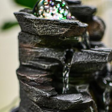Джерело води Zen'Light від Zimmerbrunnen: природний водоспад з ефектом каменів та кольоровим LED-підсвічуванням. Ідеальна декор для дому, медитації та релаксації. Об'єкт Фен-Шуй для щастя. Висота 23 см (Satya)