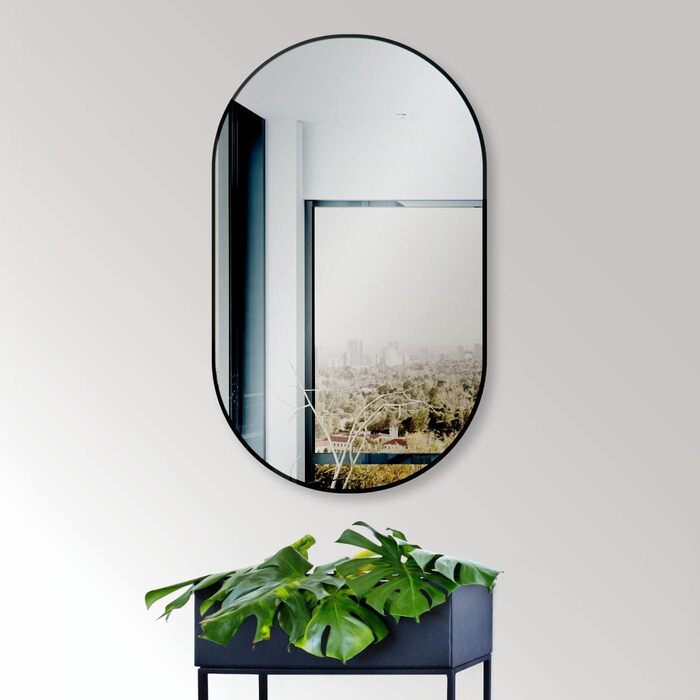 Дзеркало настінне овальне HOKO Design 45x75 см з металевим матовим каркасом. Можлива вертикальна та горизонтальна установка. Підходить для ванної кімнати, коридору, спальні та вітальні.