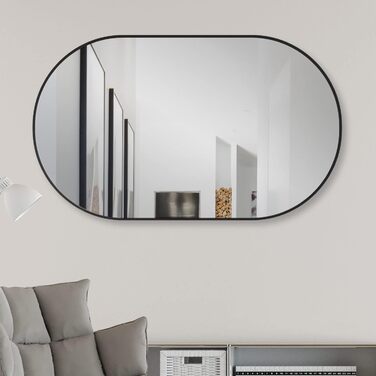 Дзеркало настінне овальне HOKO Design 45 x 75 см з металевим матовим каркасом. Можлива вертикальна та горизонтальна установка. Підходить для ванної кімнати, коридору, спальні, вітальні.