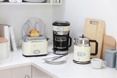 Тостер Russell Hobbs Retro 21680-56 нержавіюча сталь, 2 відділення, кремовий. З підставкою для булочок, 6 режимів, розморожування та підігрів, 1300 Вт