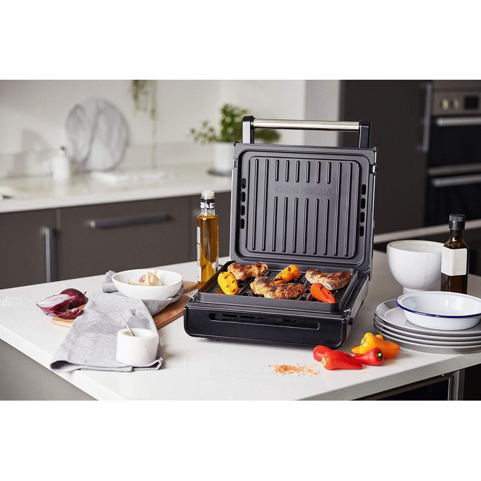 Контактний гриль George Foreman з антипригарним покриттям для приготування паніні та сендвічів [Без диму - 87% менше диму] Настільний гриль (знімні та придатні для миття в посудомийній машині пластини, температура 200°C, корпус з нержавіючої сталі) 28000-